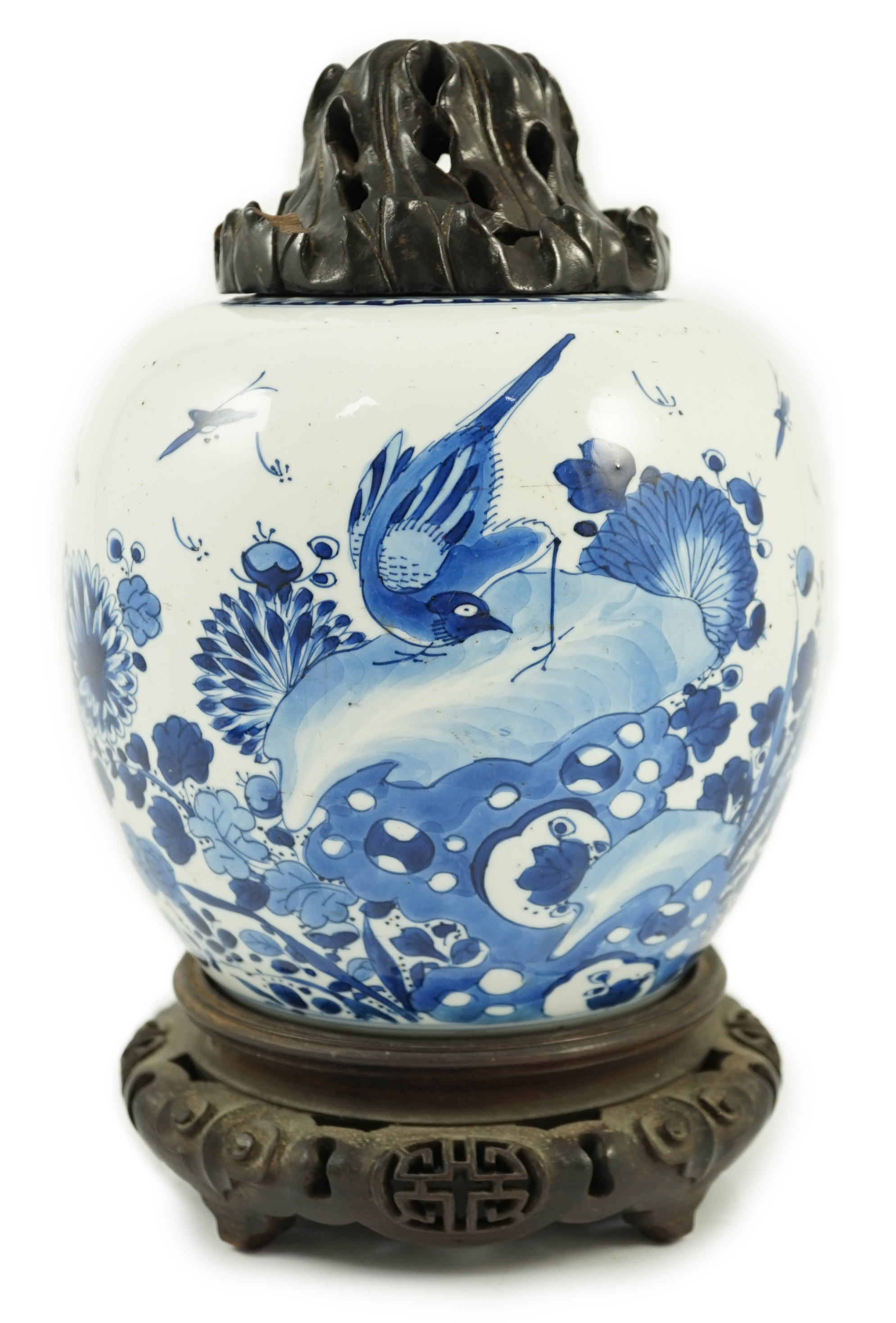 A Chinese blue and white ‘birds and rockwork’ ovoid jar, Kangxi period